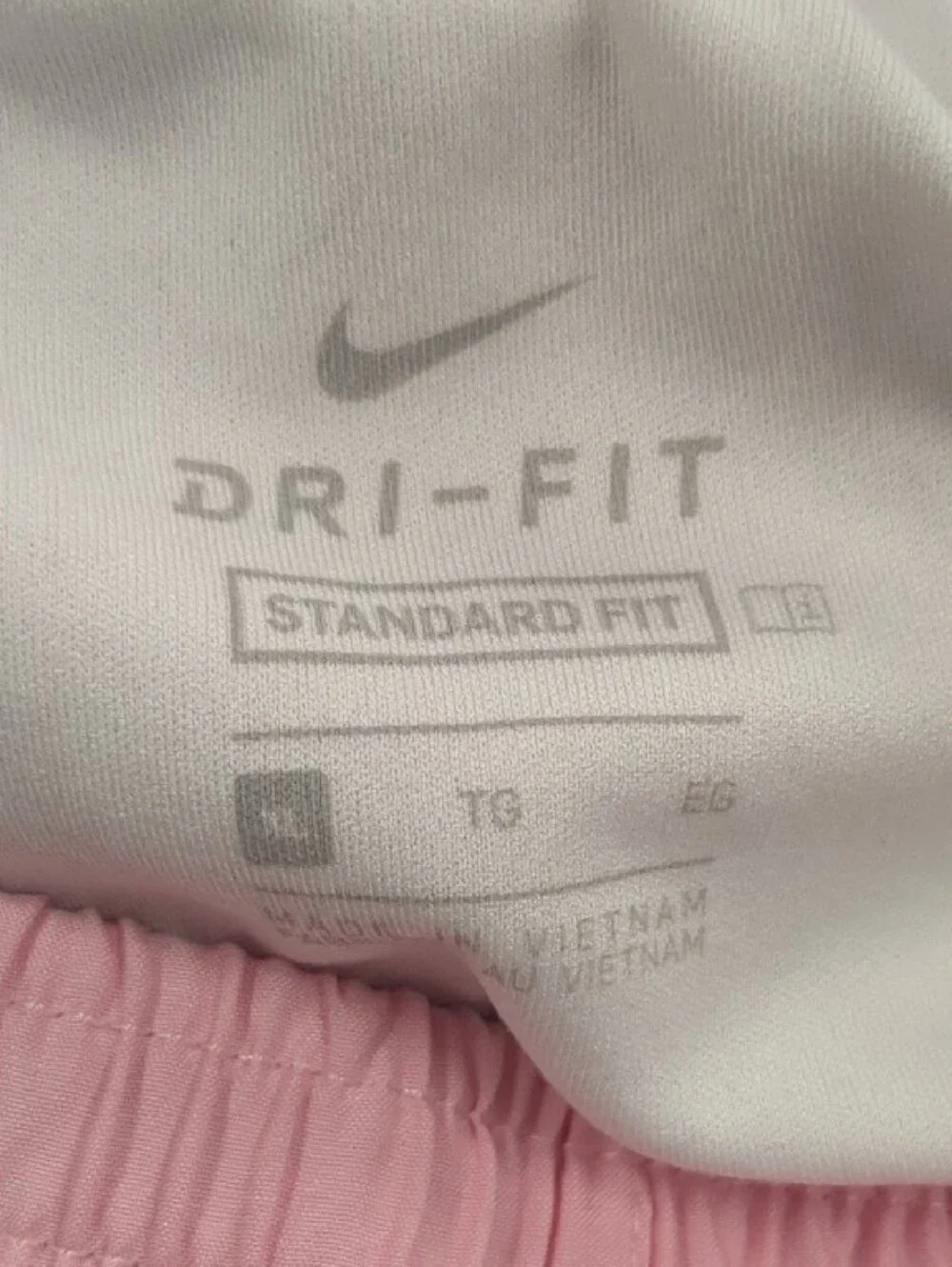 Nike Pink Athletic Shorts with Red Trim